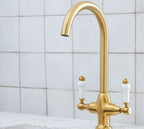 Imperial Twin Lever Traditional Style Swan Neck Mono Bloc Tap - Brushed Brass with White Levers